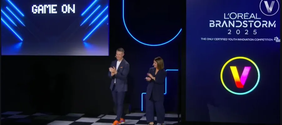 Hosts on stage at the L'Oréal Brandstorm 2025 finals
